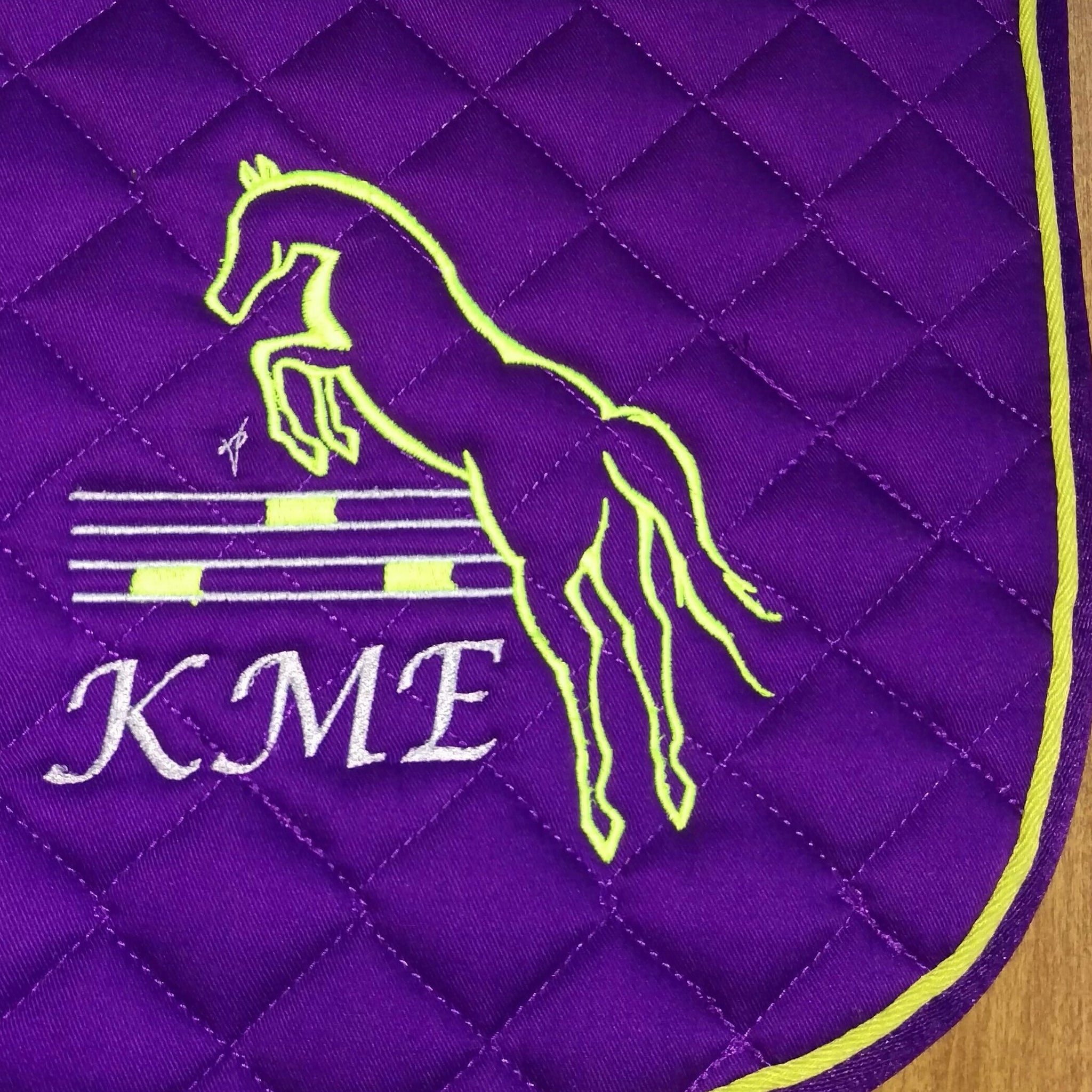 Embroidered Design on a Saddle Pad Victory Pass Originals
